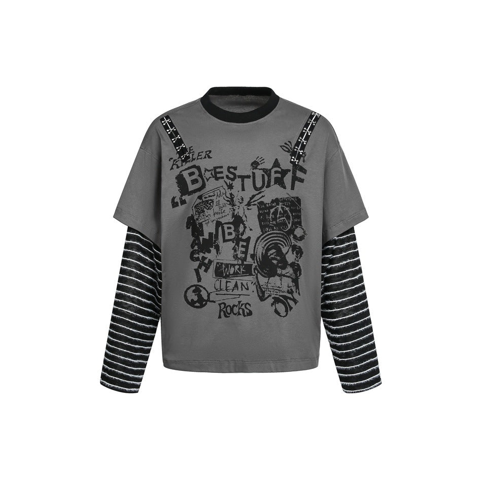 Gray faux two-piece top with black striped sleeves, black neckline, graffiti print and metal strap details, front view