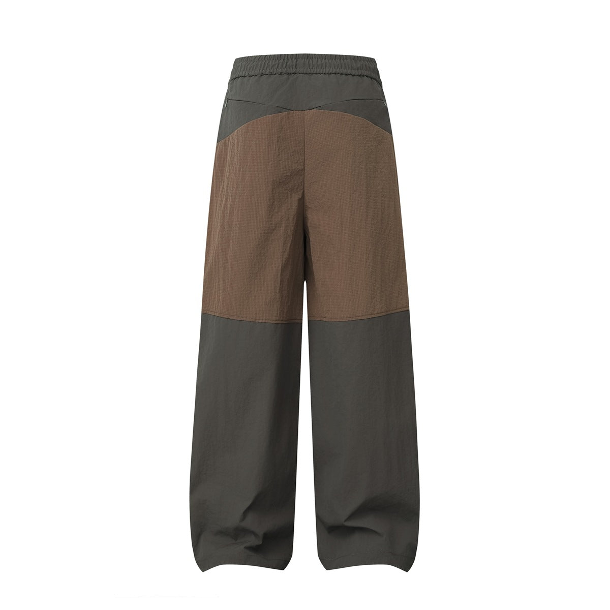 Back view of charcoal wide-leg pants with a brown upper-leg panel and gathered elastic waistband.