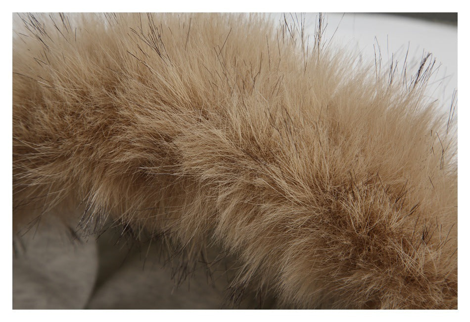 Close-up of thick tan hood trim with long wispy fibers.