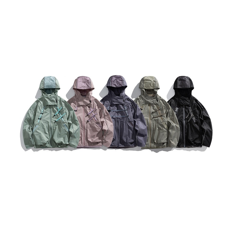 Five hooded jackets with chest straps shown together in sage, dusty pink, slate, gray-green, and black.
