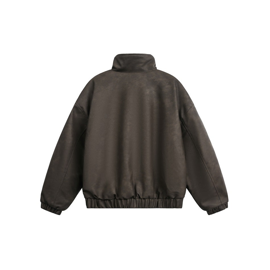 Back view of a dark brown jacket with a high collar and elasticated cuffs and hem.