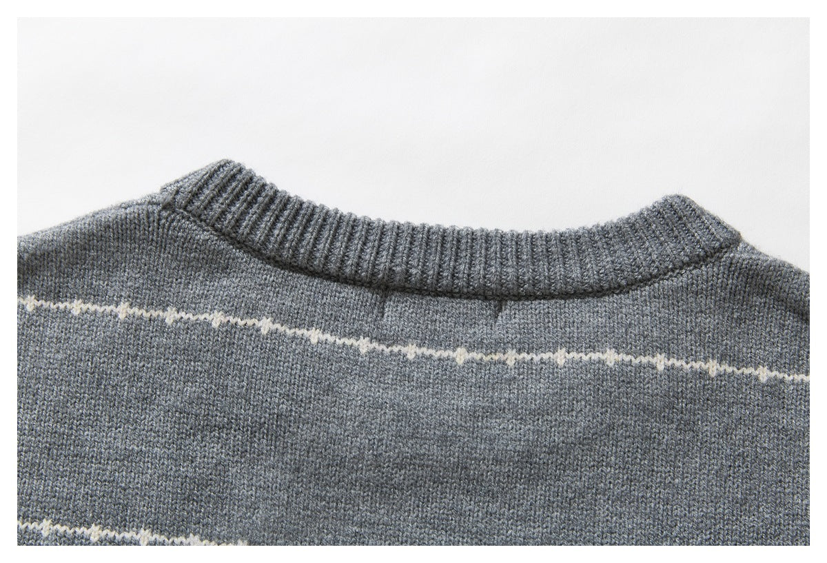 Close-up of the gray sweater’s back neckline, ribbed collar, and narrow cream stripe.