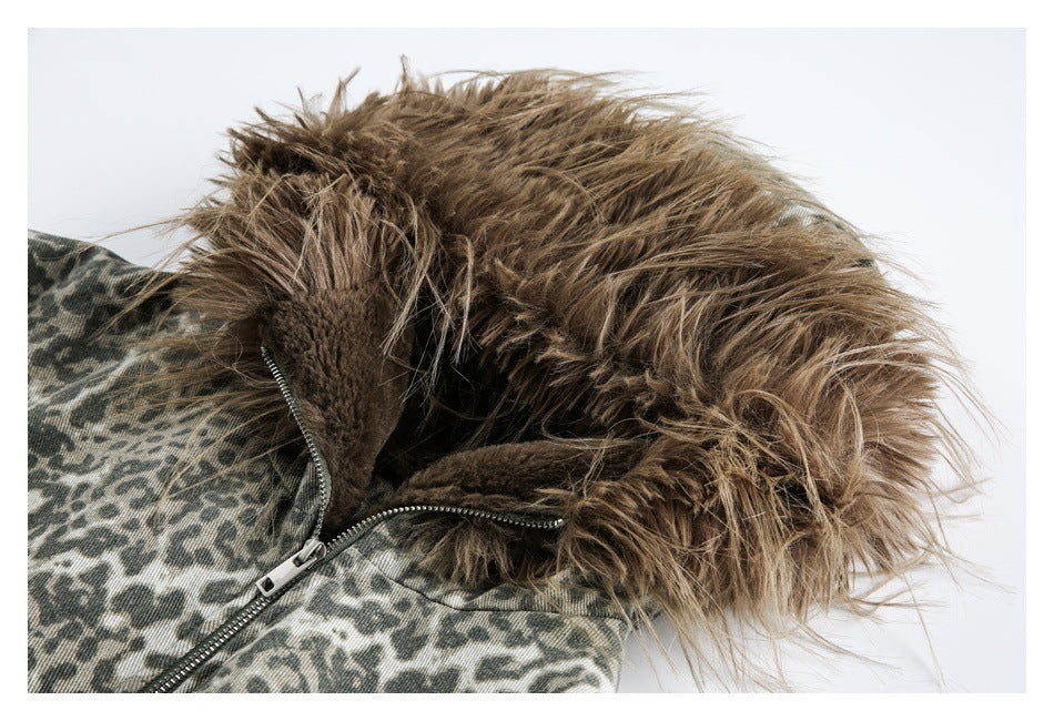 Close-up of the jacket's brown fur-trimmed hood, plush inner edge, leopard-print fabric, and zipper.