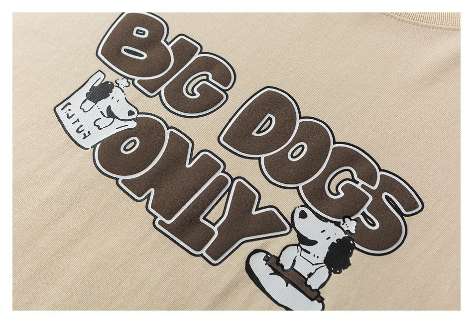 Close-up of a beige T-shirt graphic with “BIG DOGS ONLY” lettering and cartoon dogs.