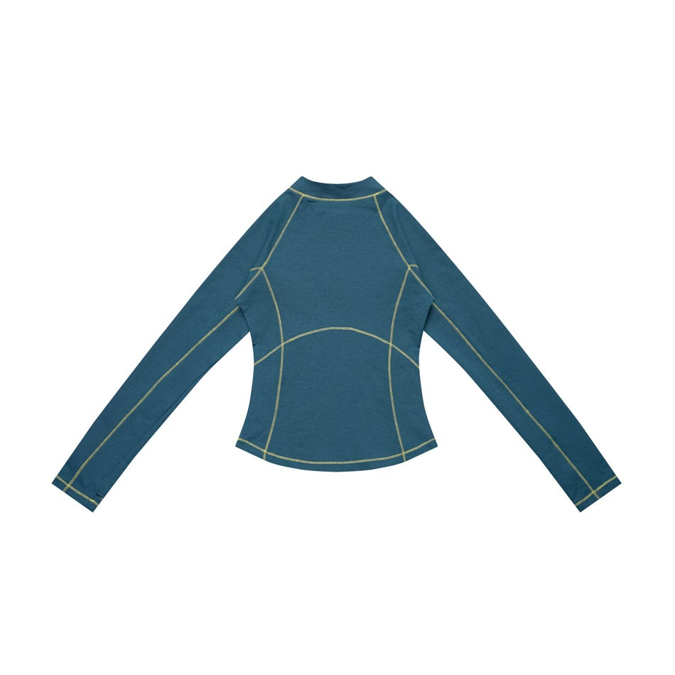 Back view of a teal long-sleeve top with a short stand collar and contrasting yellow-green seam lines.