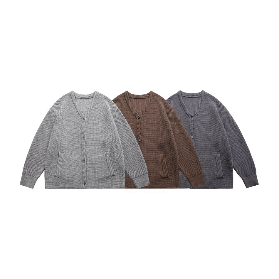 Three button-front V-neck cardigans with pockets, shown in light gray, brown, and dark gray.