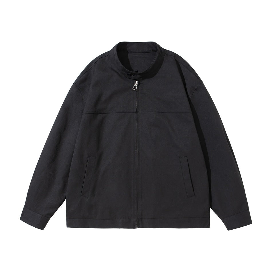 Black stand-collar zip jacket flat lay, front view with yoke seam and slanted pockets