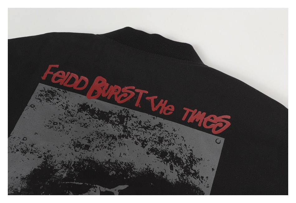 Close-up of the jacket's back graphic, with red lettering above a gray image.