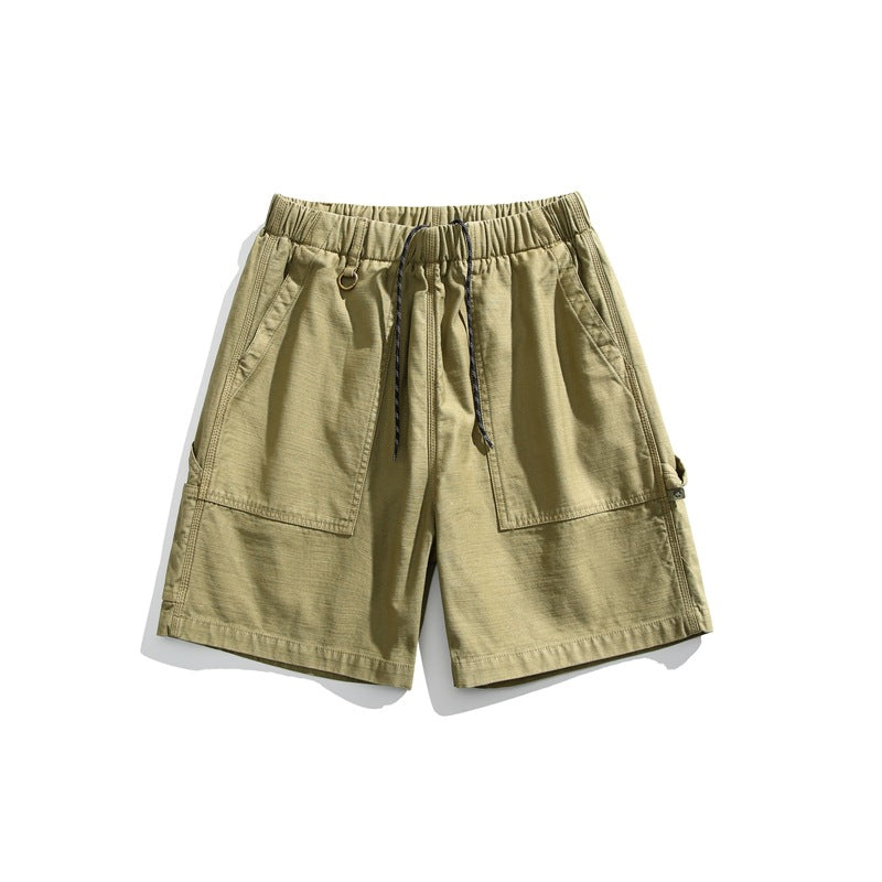 Light army green men's drawstring shorts with large front patch pockets, front view on white background
