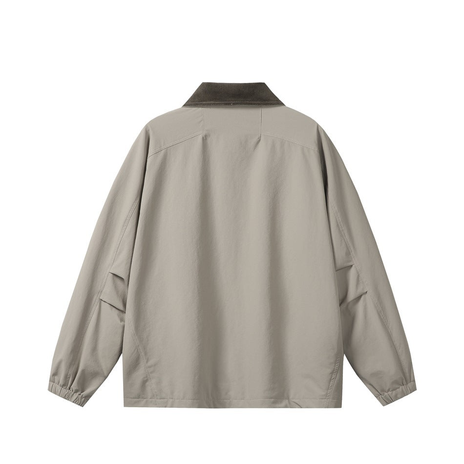 Back view of a light taupe jacket with a dark ribbed collar and elasticized cuffs, shown flat on white.