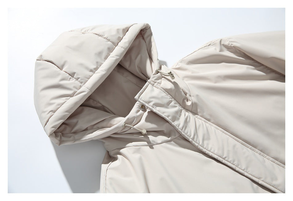 Close-up of the parka's padded hood, adjustable drawcords and upper front placket.