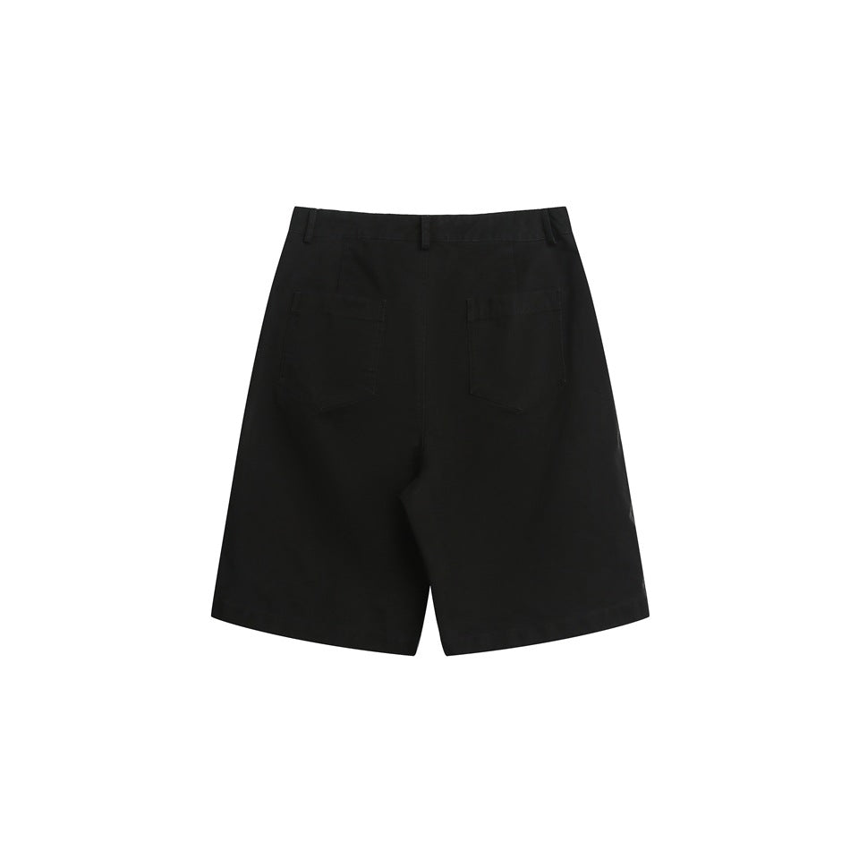 Back view of black shorts with belt loops and two rear patch pockets.