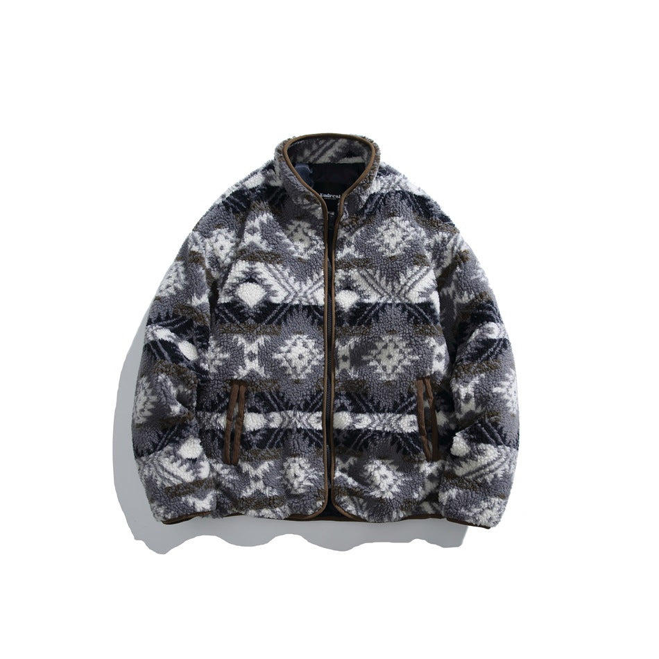 Gray, navy and cream geometric pattern fleece-like zip jacket with brown piping and front pockets, flat lay front view