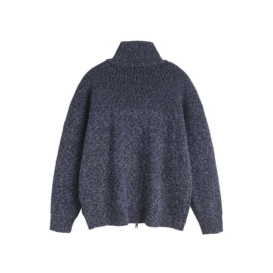 Back view of a navy marled knit sweater with a high collar and long sleeves.