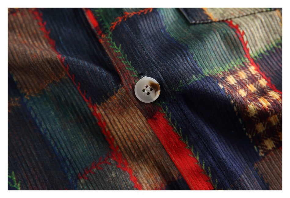 Close-up of a light-colored button on multicolored patchwork fabric with a ribbed texture.