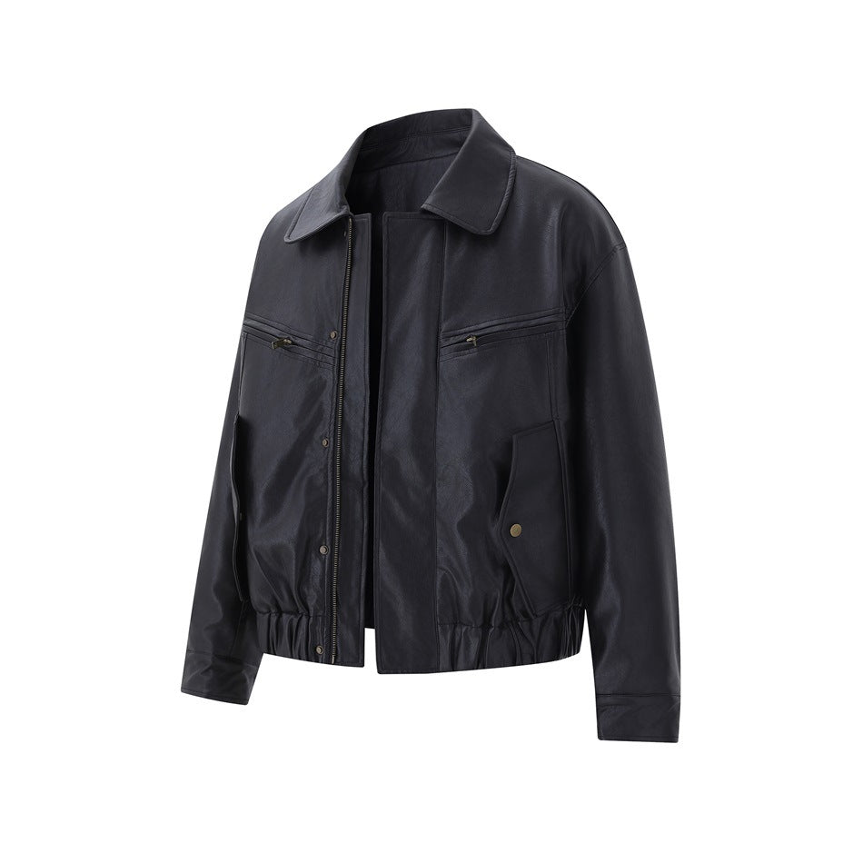 Black faux-leather-look jacket, angled front view with open zip, collar, chest zip pockets, flap pockets and elastic hem