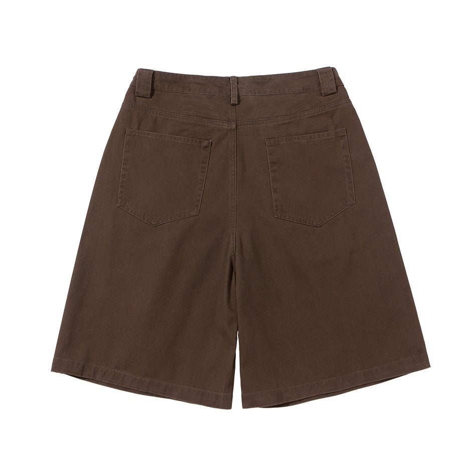 Back view of dark brown wide-leg shorts with belt loops and two patch pockets.