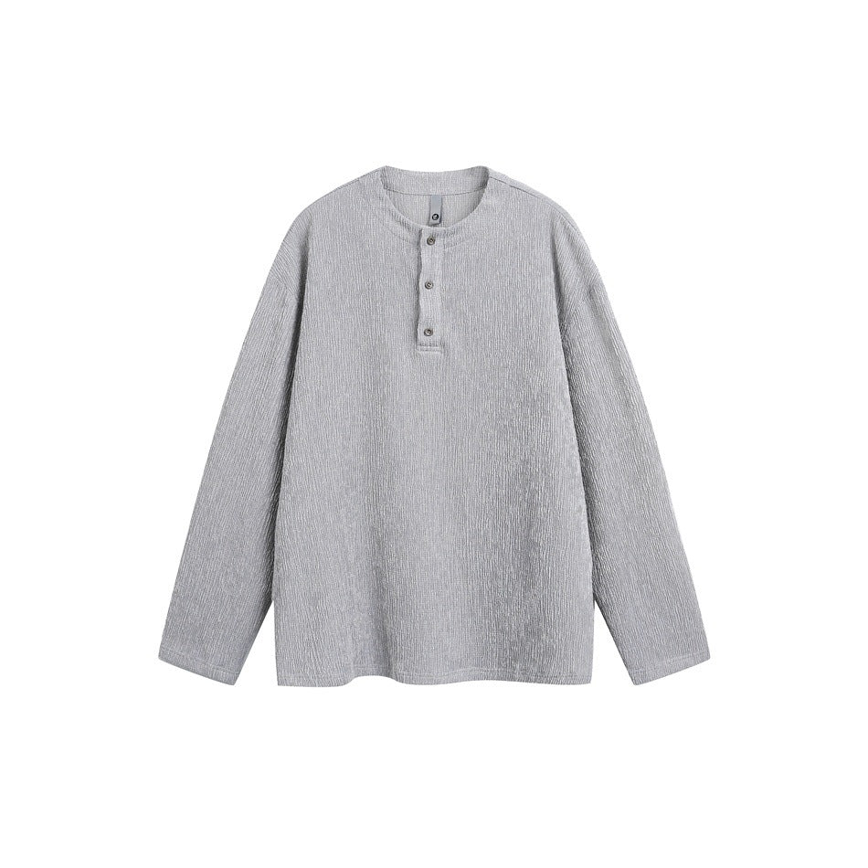 Light gray long-sleeve Henley-style pullover with textured crinkled fabric and three buttons, flat front view