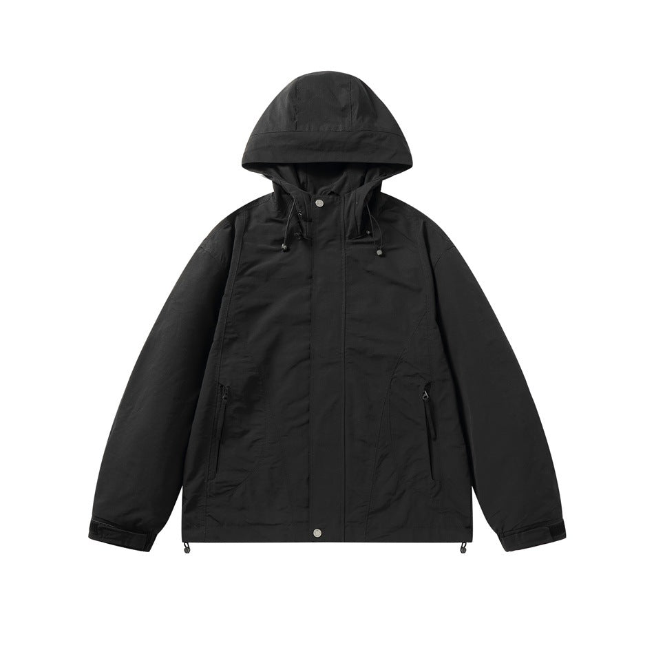 Black hooded zip-front jacket with drawcord hood, zippered pockets and tab cuffs, flat lay front view