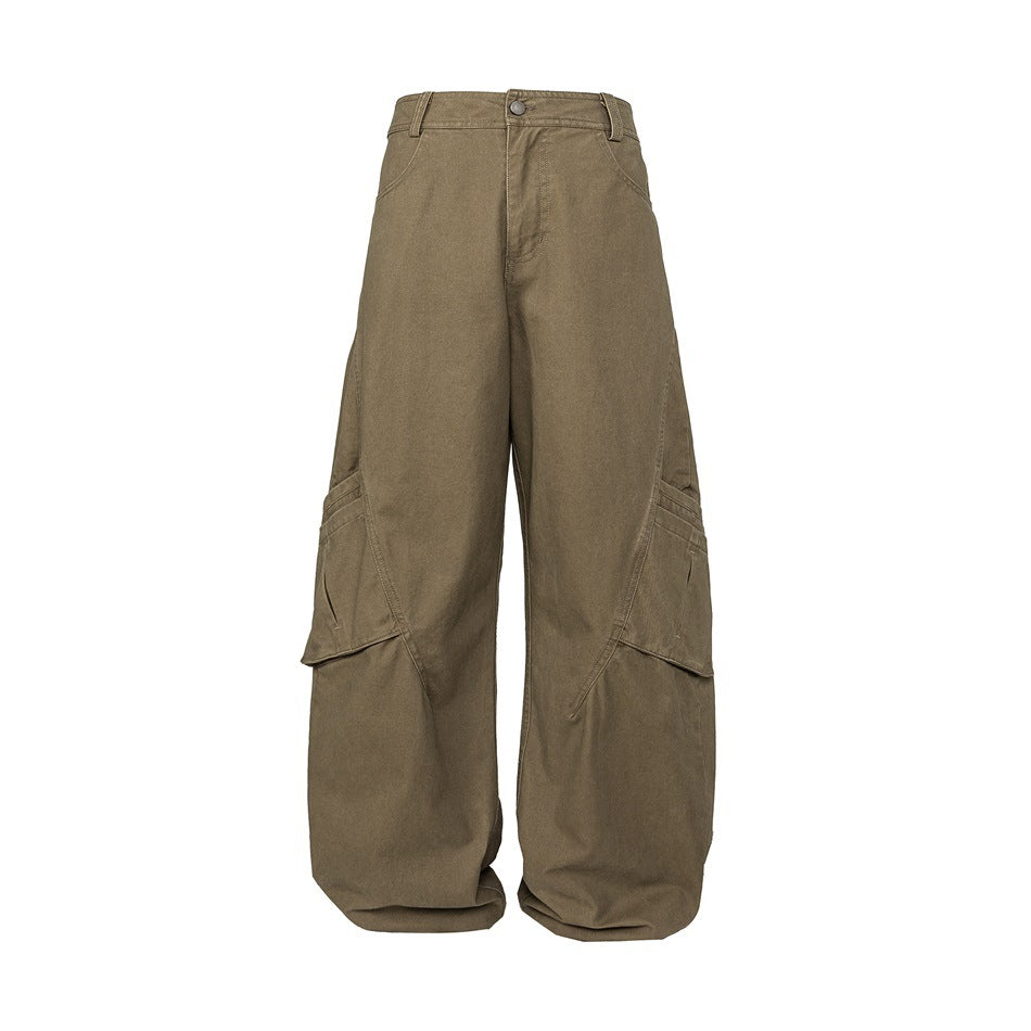 Front view of brown-olive, wide-leg cargo pants with large flap pockets on the sides.