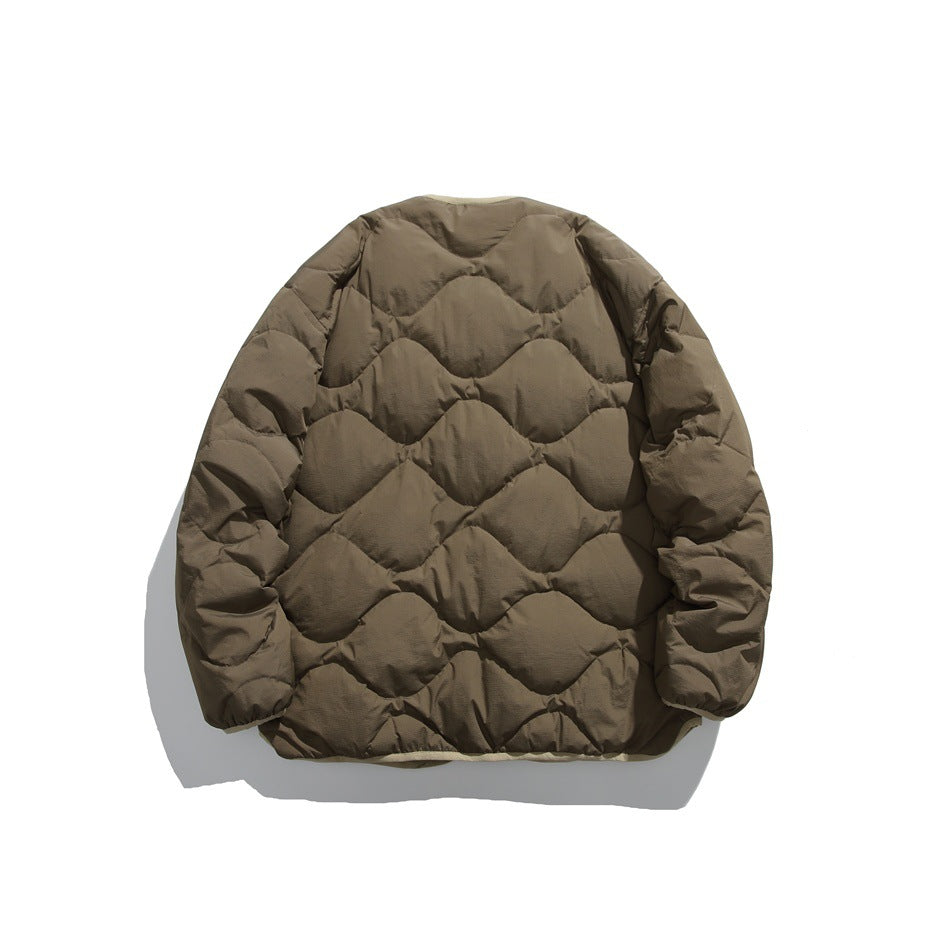 Back view of a taupe-brown quilted jacket with a repeating wavy pattern.