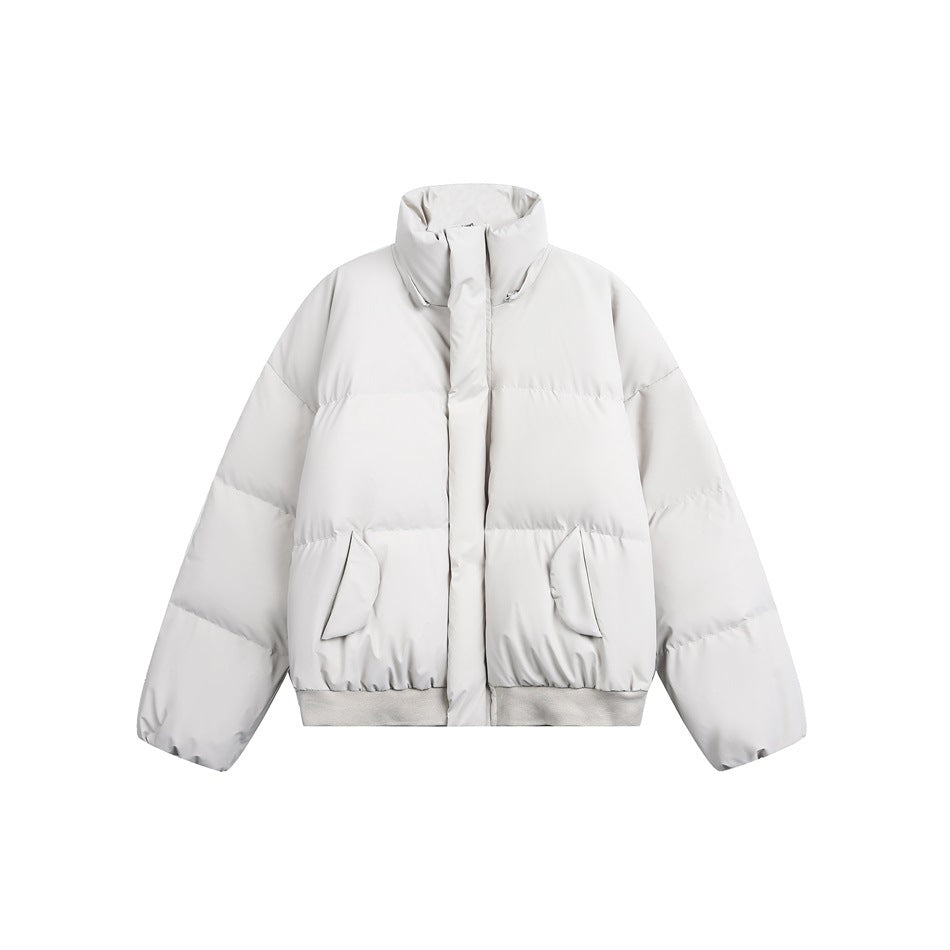 Light gray puffer jacket shown from the front, with a high collar, snap-covered zipper, and two pockets.