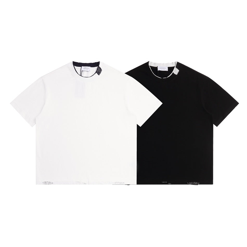White and black short-sleeve crew-neck T-shirts shown from the front.