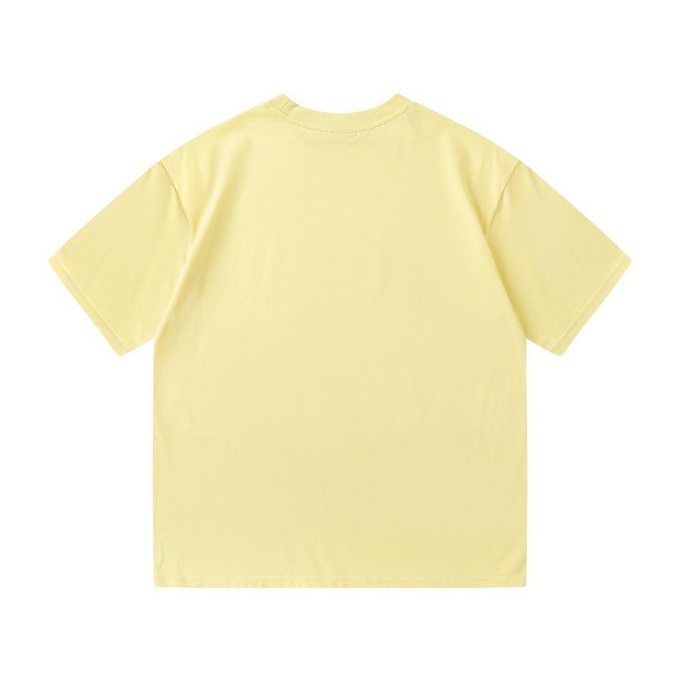 Back view of a plain pale yellow short-sleeve crew-neck T-shirt laid flat.