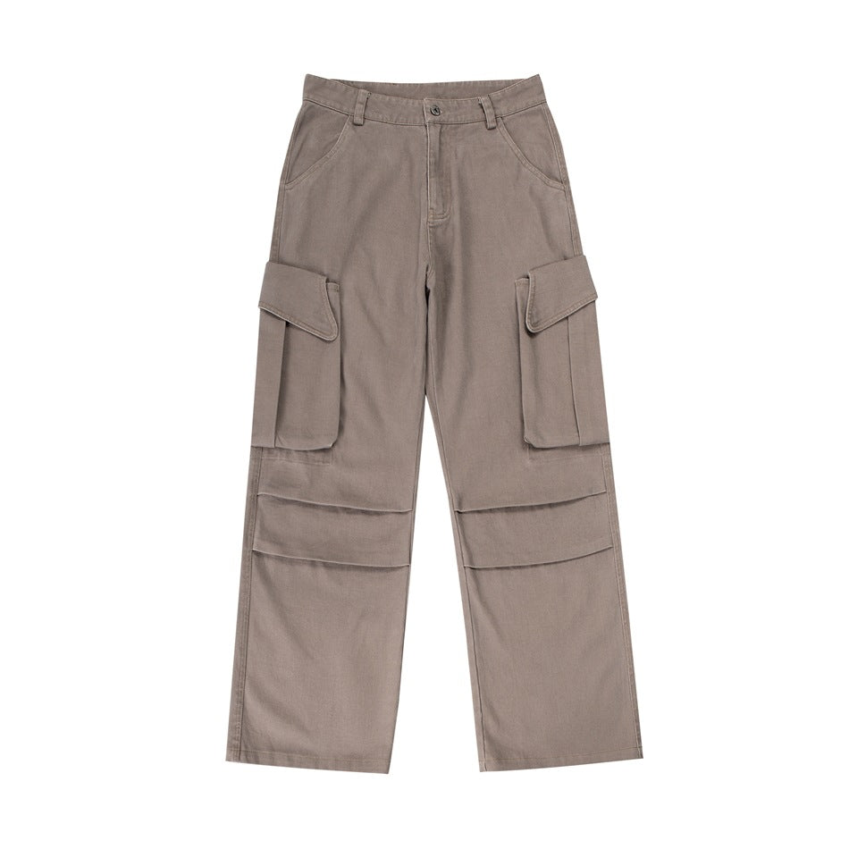 Khaki wide-leg cargo pants flat lay with large flap thigh pockets and knee pleats