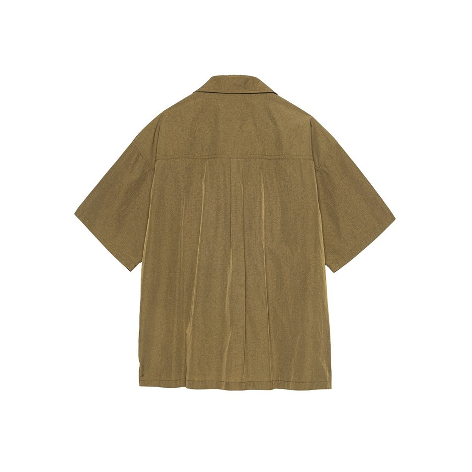 Back view of dark khaki short-sleeve shirt showing yoke seam and center pleat