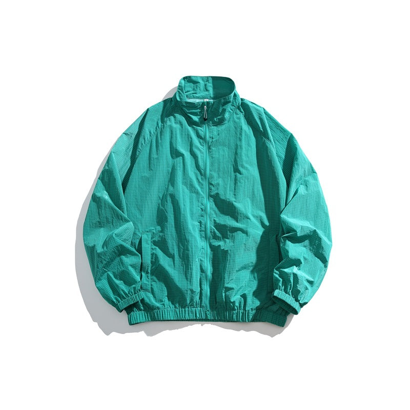 Jade green stand-collar zip-front jacket laid flat with subtle grid texture