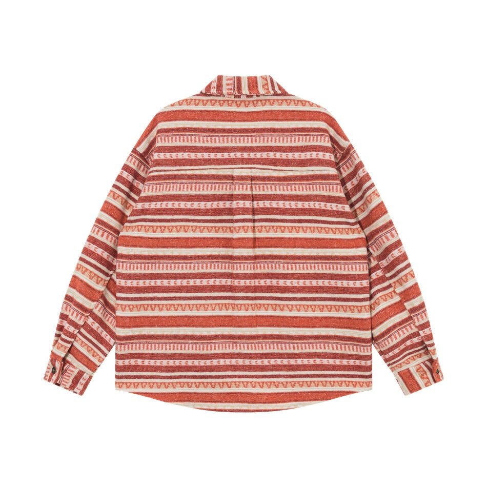Back view of red and cream striped geometric long-sleeve shirt with back yoke pleat and buttoned cuffs