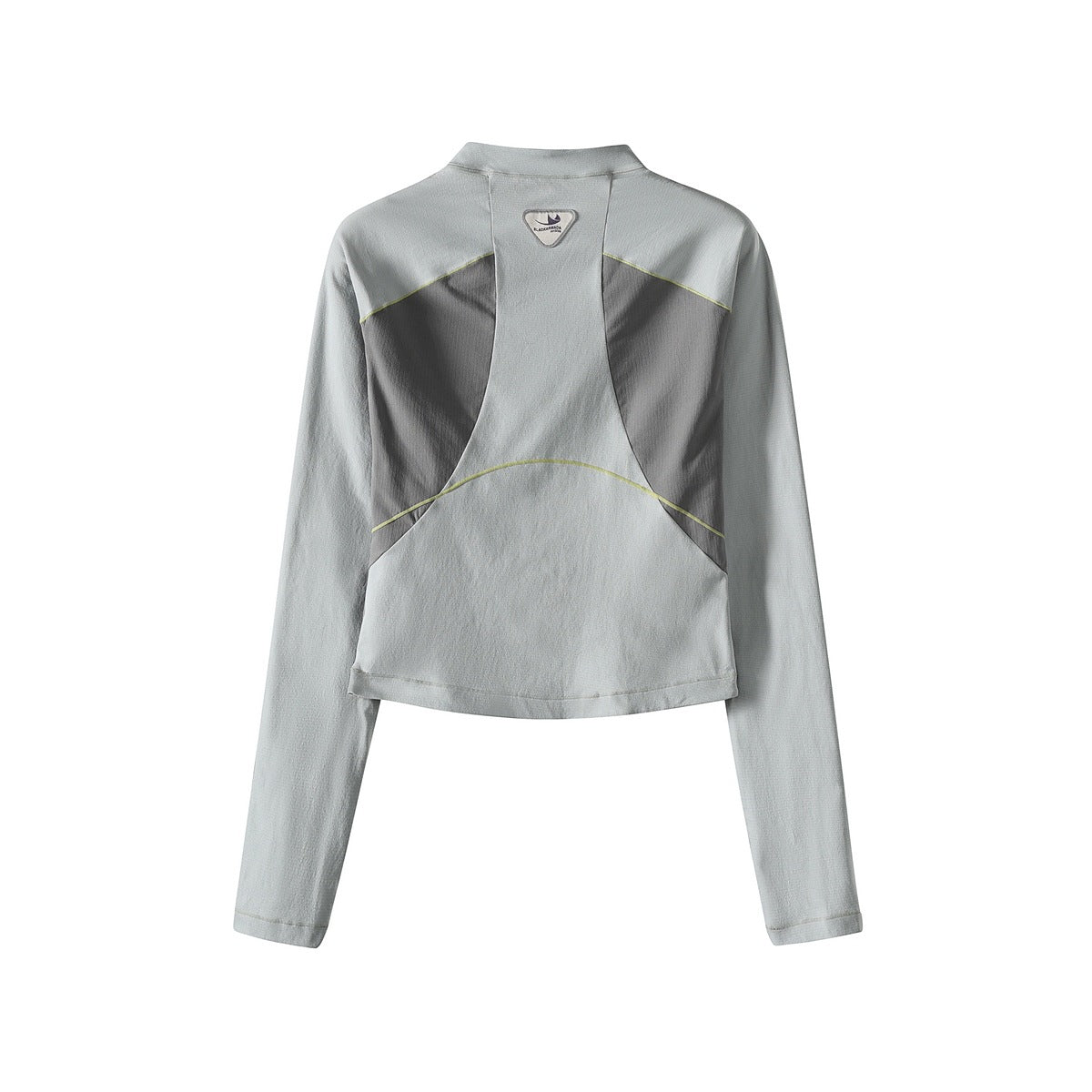 Back view of a pale gray cropped long-sleeve top with dark gray panels and fine lime piping.