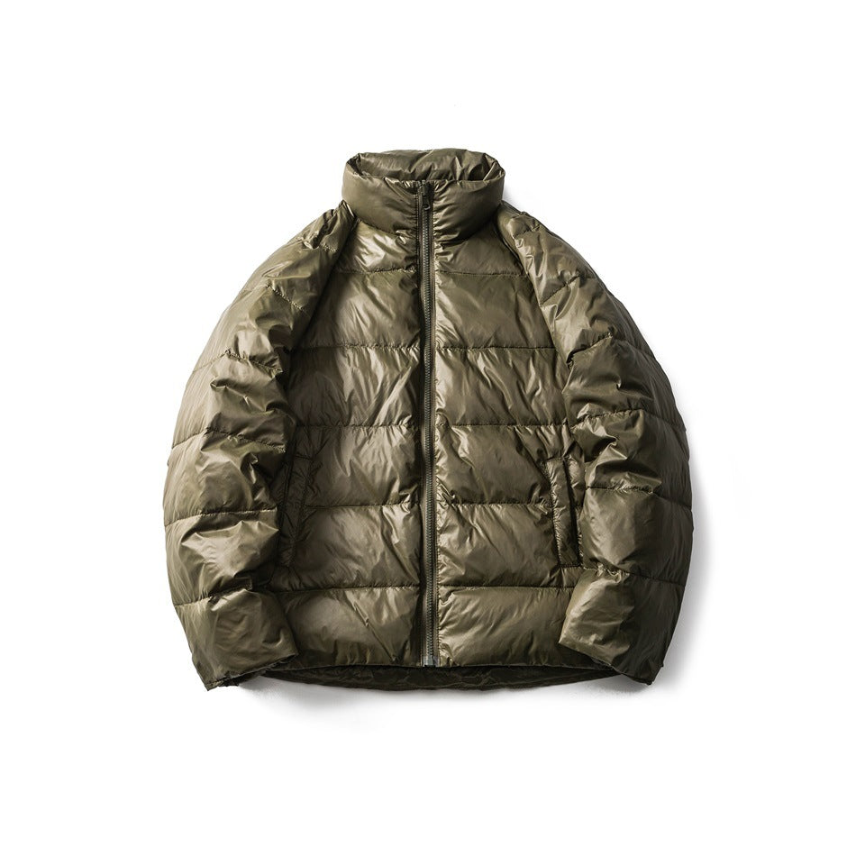 Front view of an olive-green quilted puffer jacket with a high collar, front zipper, and side pockets.