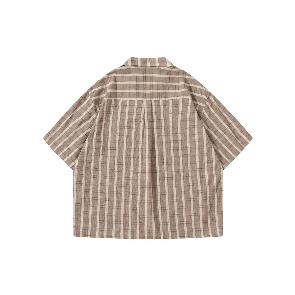 Back view of brown short-sleeve striped shirt with yoke seam and center pleat