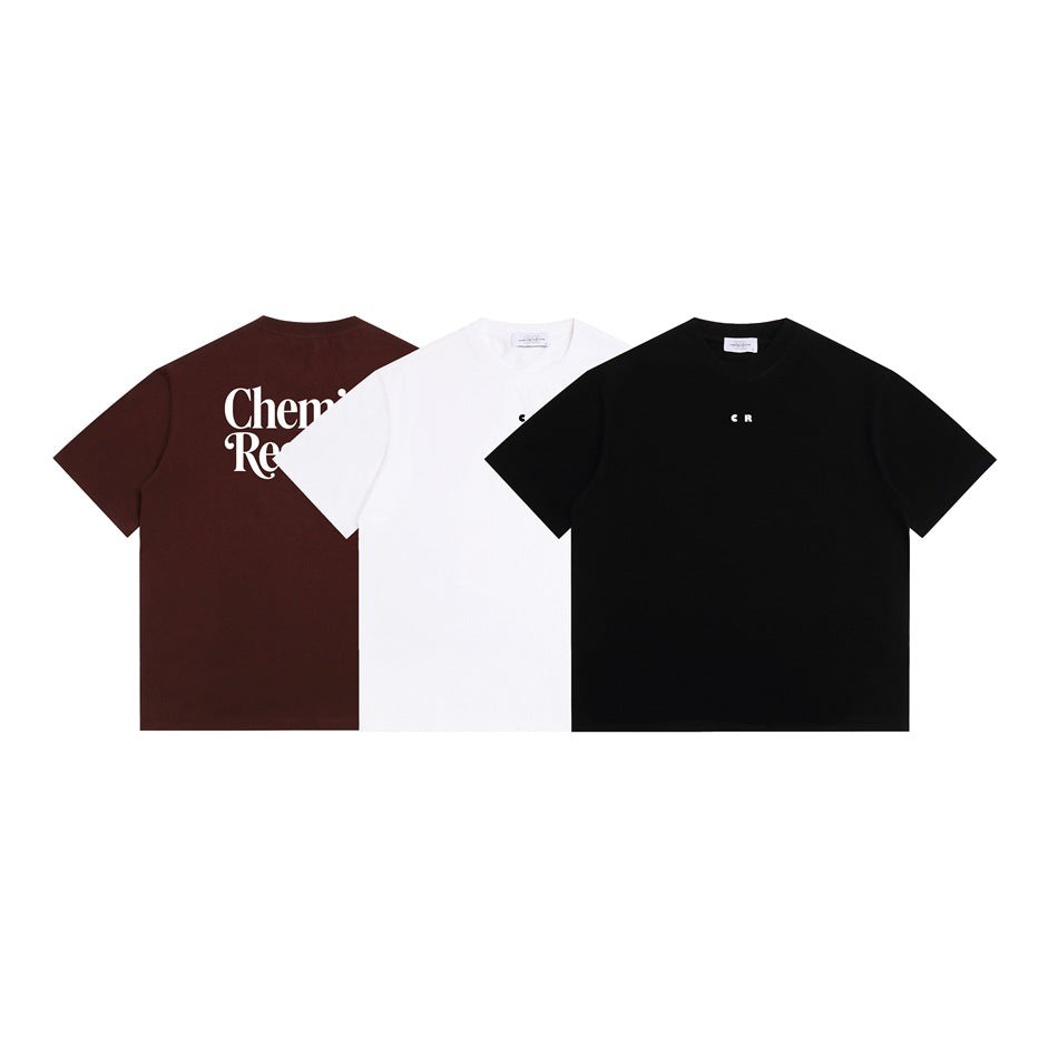 Three T-shirts shown together: burgundy with large white back lettering, white with a small chest mark, and black with a