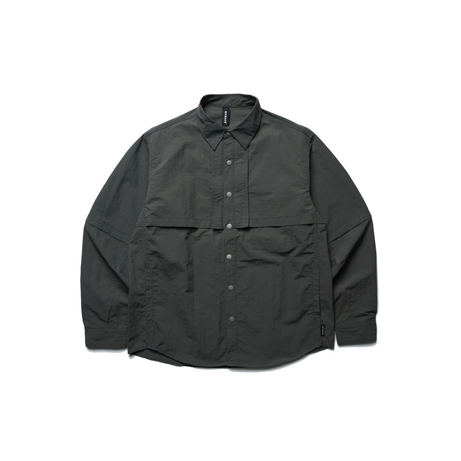 Dark green long-sleeve snap-front shirt jacket with layered chest panel and chest pocket, flat lay on white