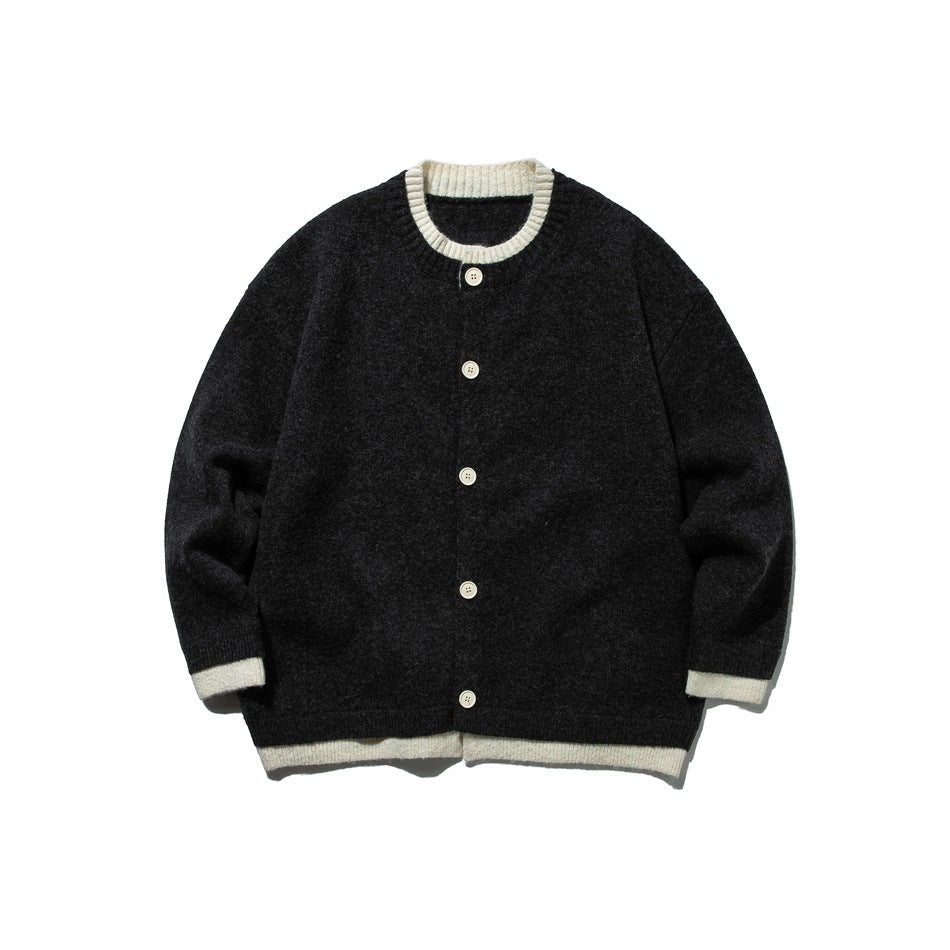Dark gray button-front knit cardigan with cream ribbed collar, cuffs and hem, flat front view