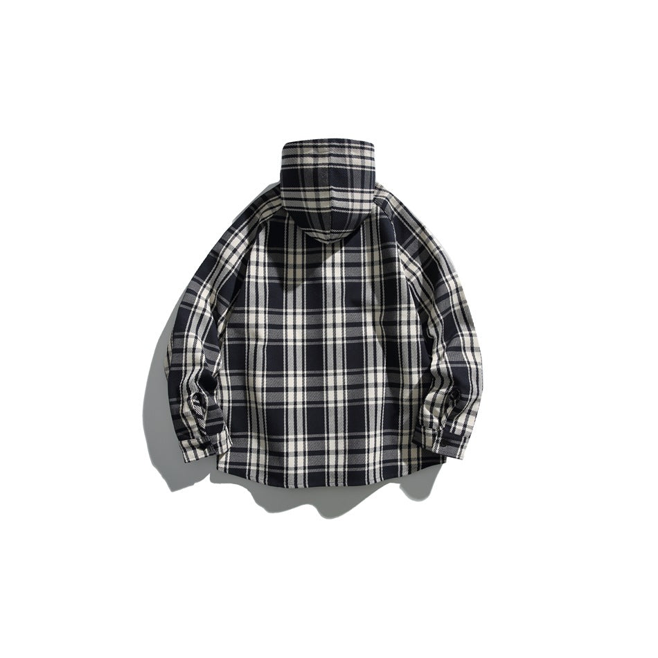 Back view of a black, gray, and cream plaid hooded button-up shirt jacket laid flat on a white background.