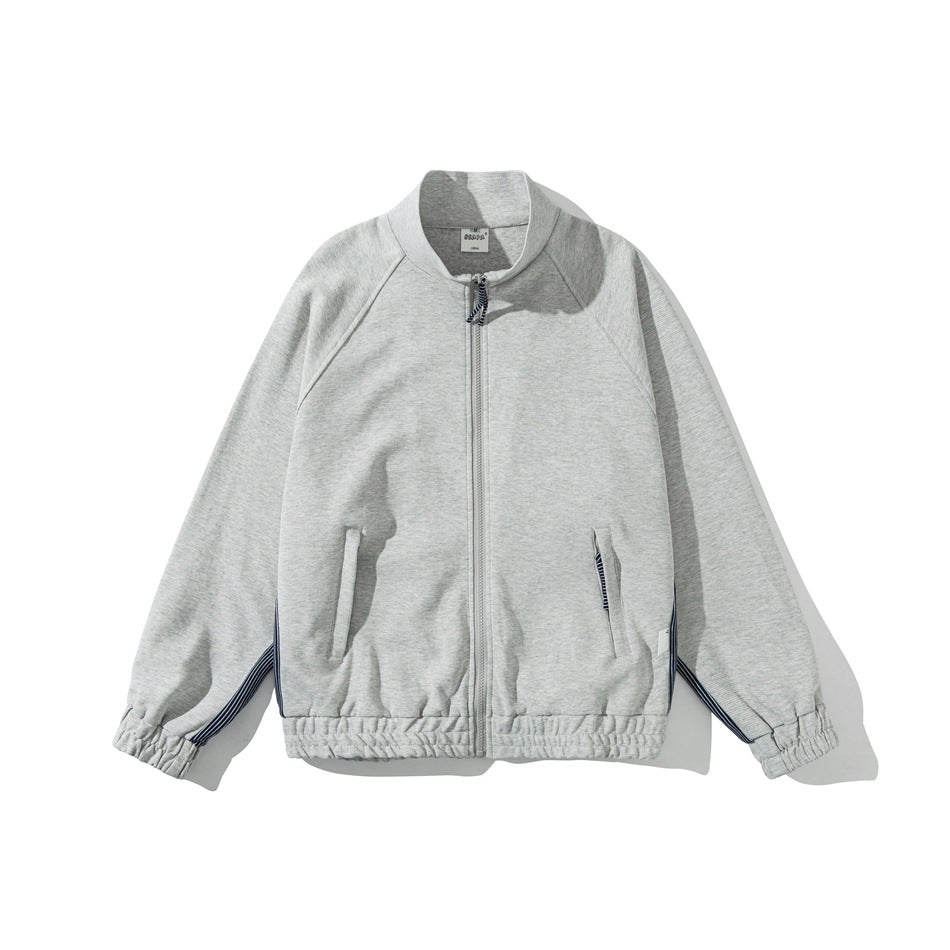 Heather gray zip-front stand-collar jacket with raglan sleeves, zip pockets, elastic cuffs and hem, flat lay