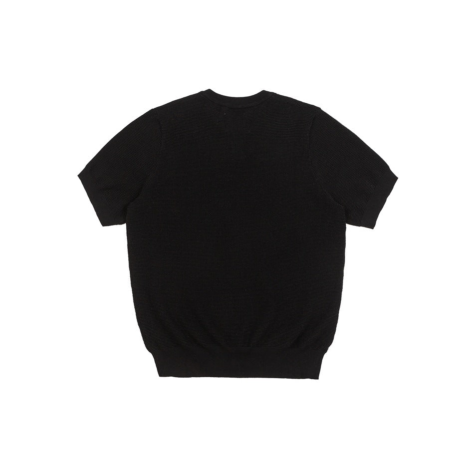 Back view of a black short-sleeve knit Henley top with ribbed sleeve cuffs and hem.