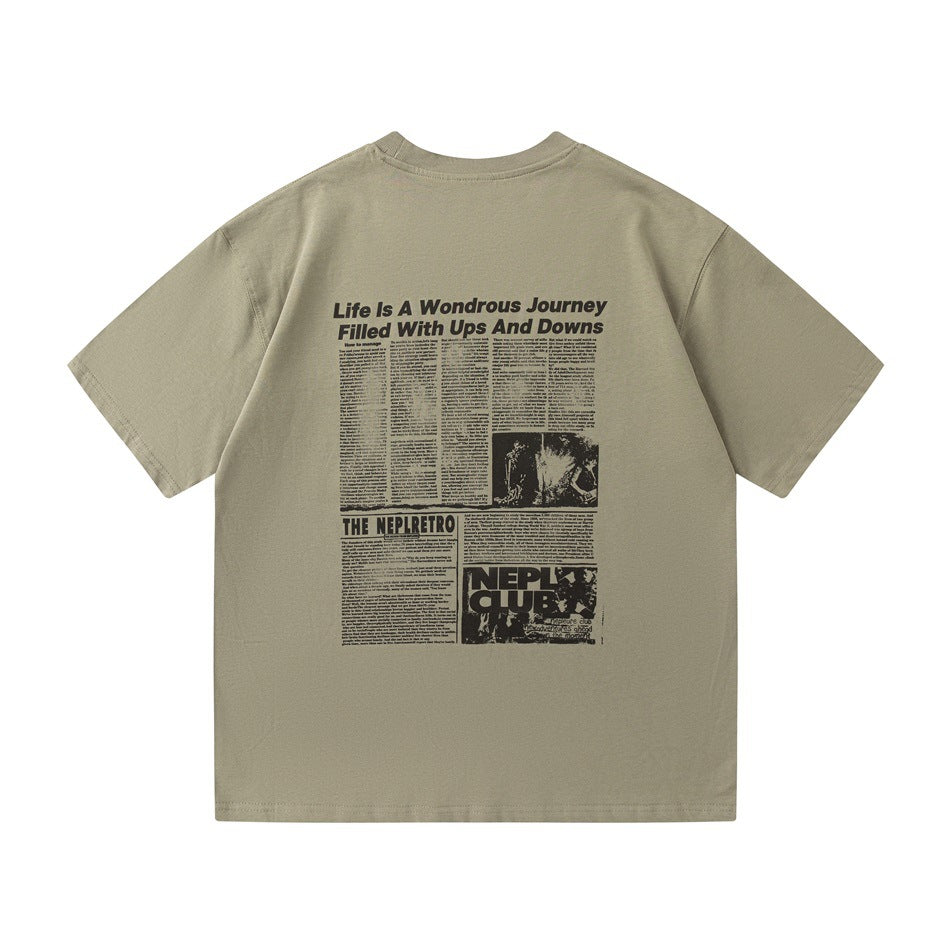 Avocado green short-sleeve crew-neck T-shirt, back view with black newspaper-style print and headline text