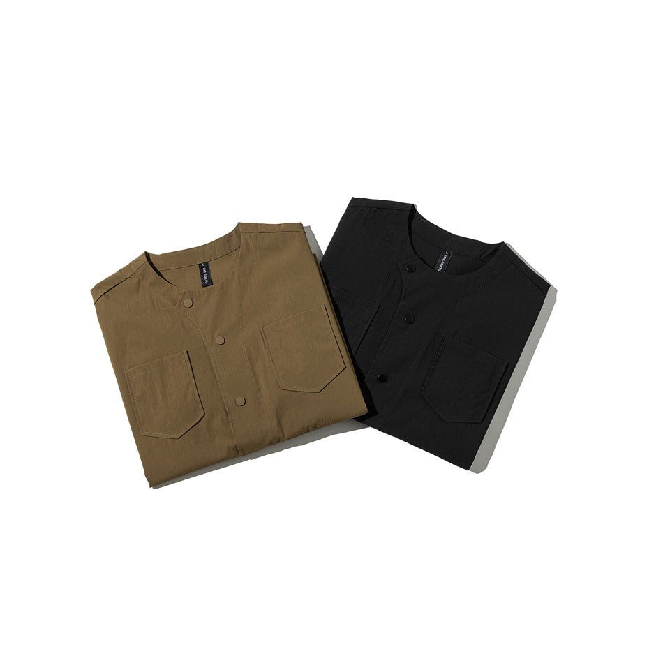Folded olive-brown and black button-front shirts arranged together, with their chest pockets visible.