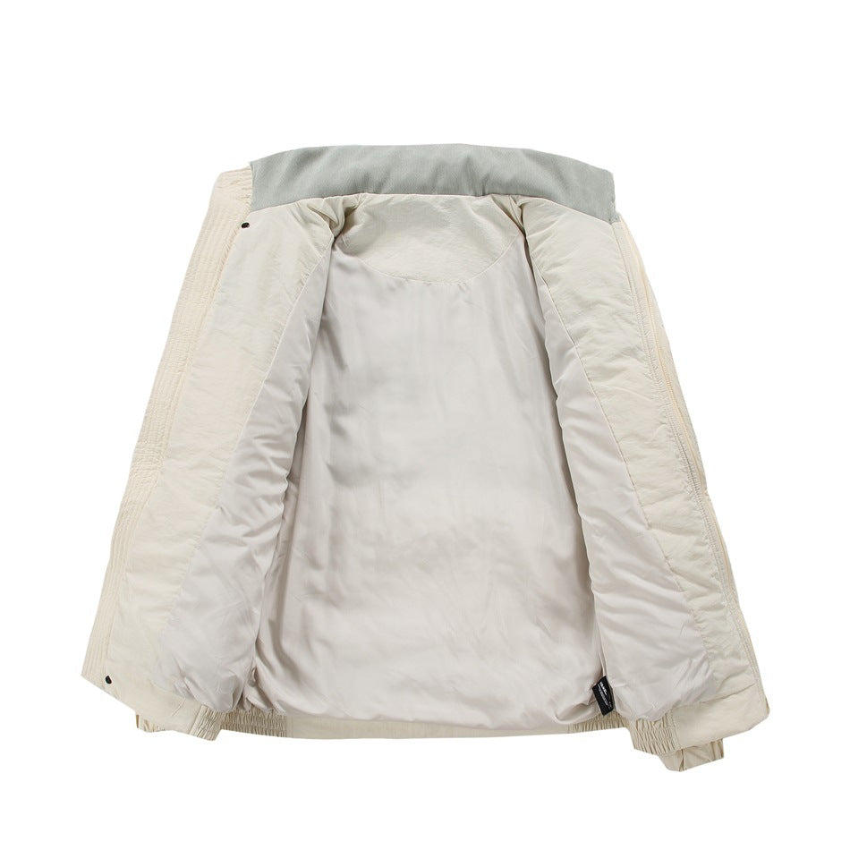 The cream jacket is open to show its light-colored lining and interior construction.