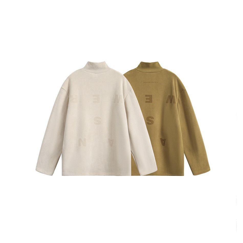 Two high-neck pullovers shown from the back in cream and mustard brown, each with scattered lettering.