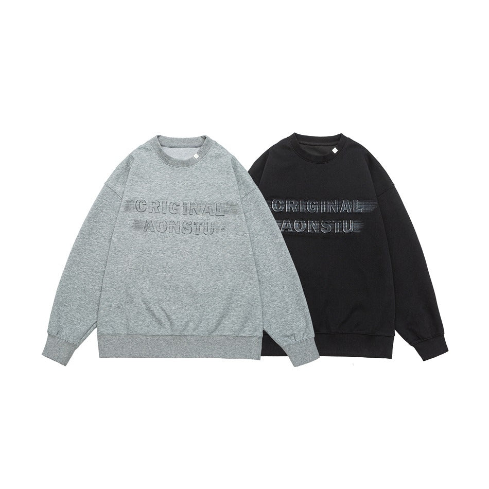Light gray and black crewneck sweatshirts shown side by side, each with raised lettering on the chest.