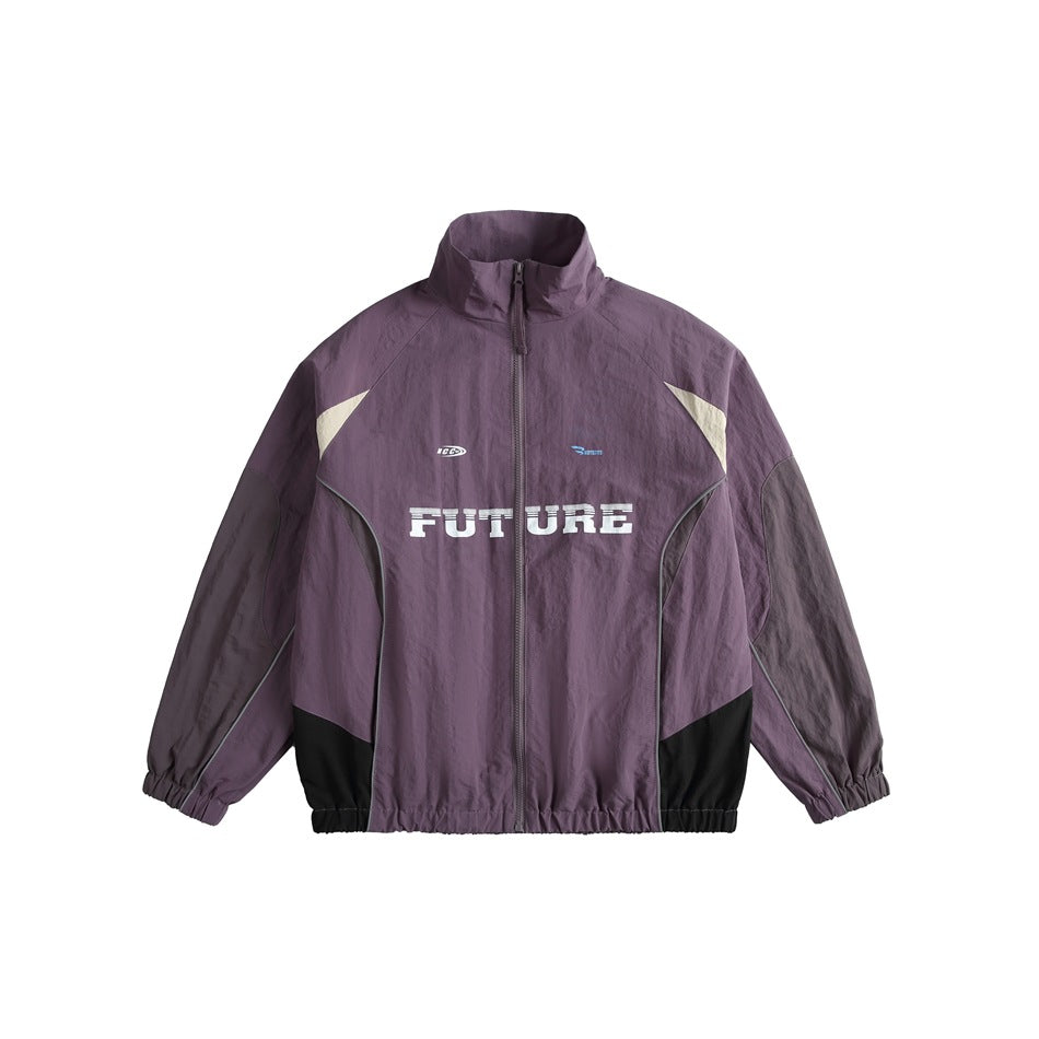 Purple track-style jacket with gray sleeves, black hem panels, cream accents and white FUTURE chest print, front view