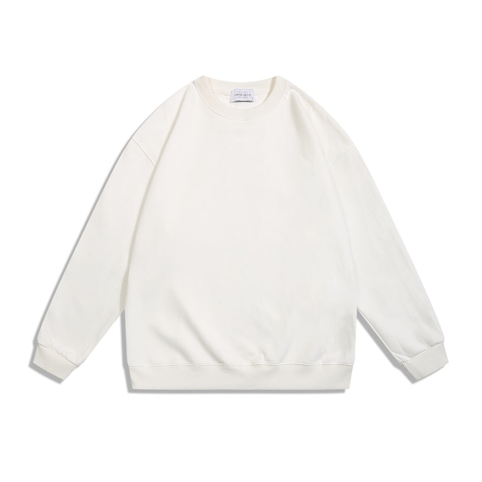 White crew neck sweatshirt flat lay, front view, with ribbed collar, cuffs and hem
