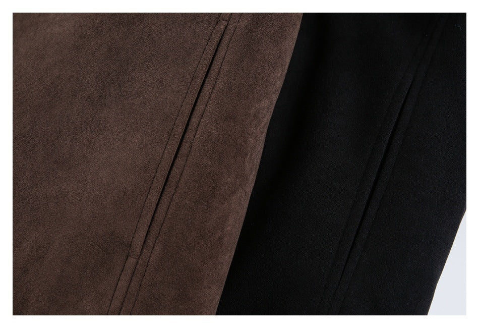 Close-up comparison of brown and black jacket fabric and stitching.