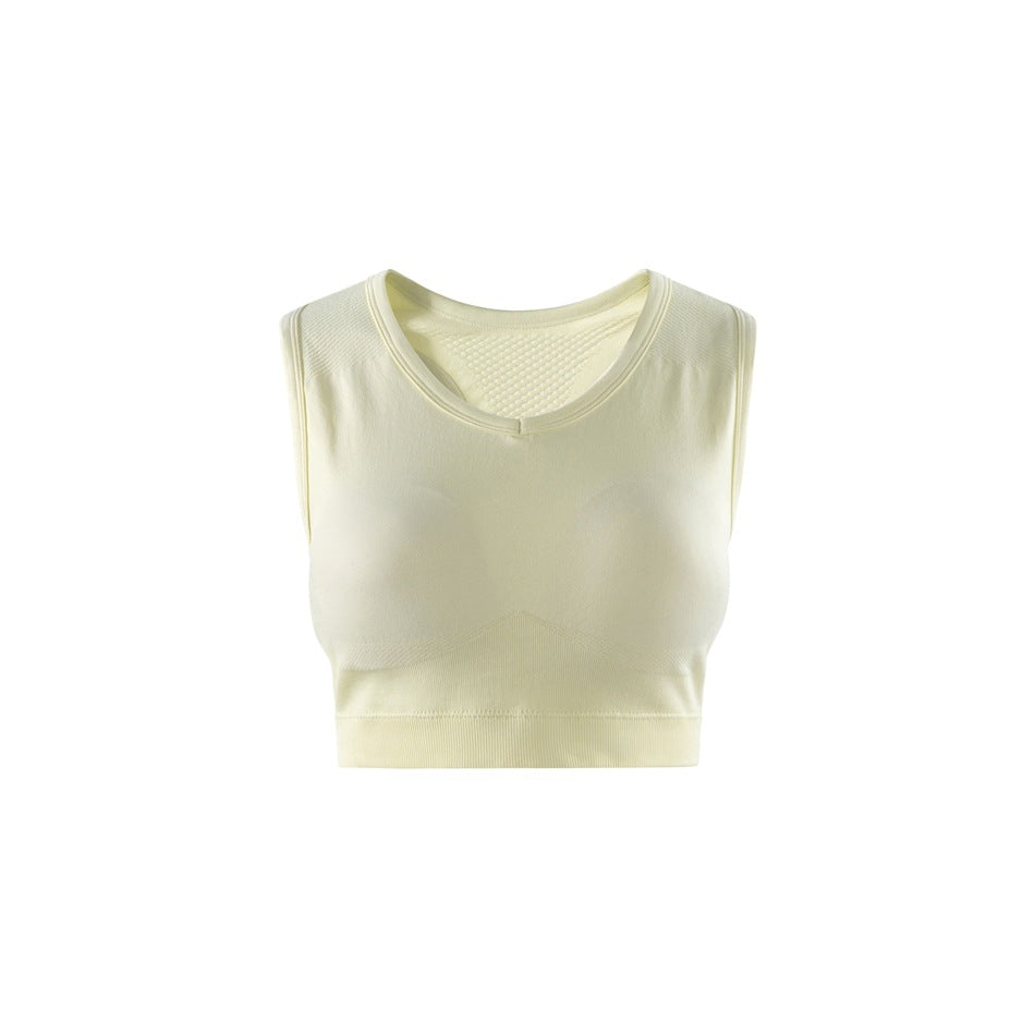 Pale jasmine yellow sleeveless cropped top, front view, with a V seam at the neckline and a ribbed hem band